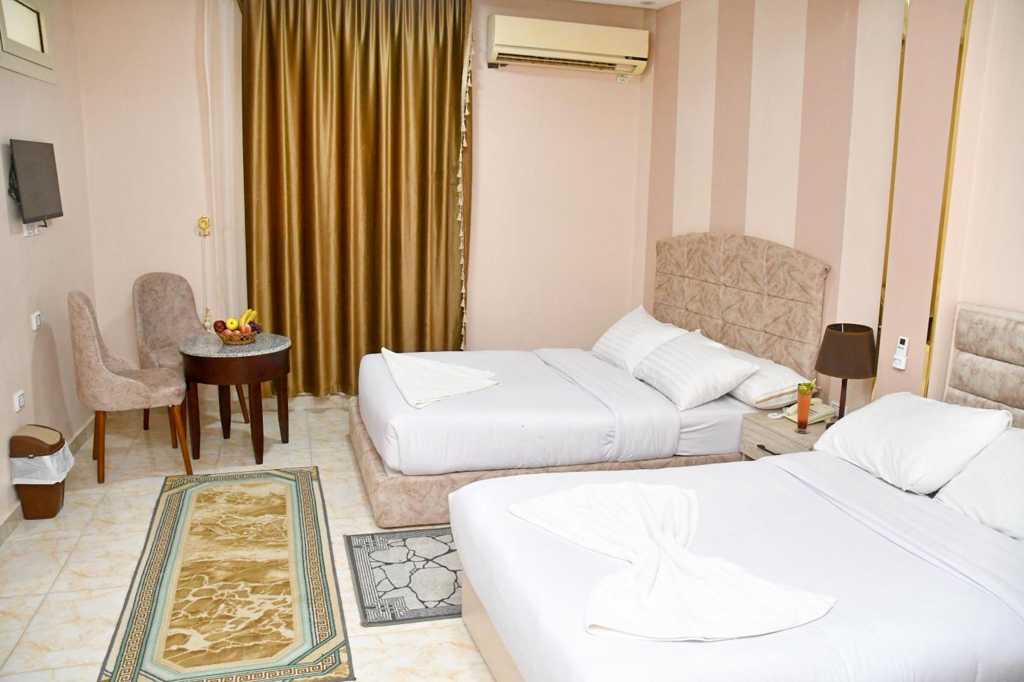 Nun Pyramids Hotel Kafrat al Jabal Quarto foto